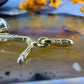 18 karaat gouden saxofoon hanger