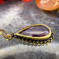 14 karaat gouden hanger met paarse steen