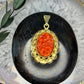 14 karaat gouden hanger met bloedkoraal