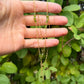 14 karaat gouden ketting met groene steentjes