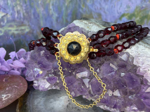 14 karaat gouden granaat armband